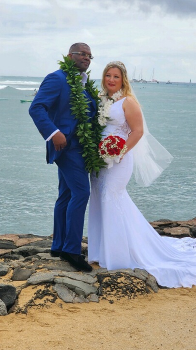 beautiful married couple by the sea